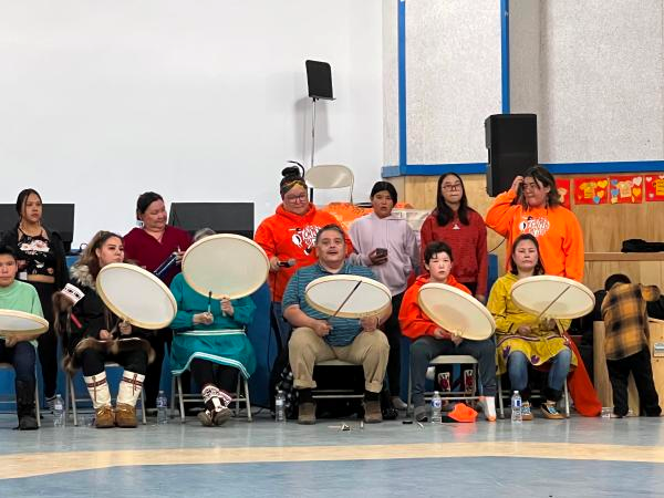 People sitting in a hall